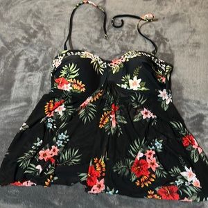 Women's takani top sheer type material split in front